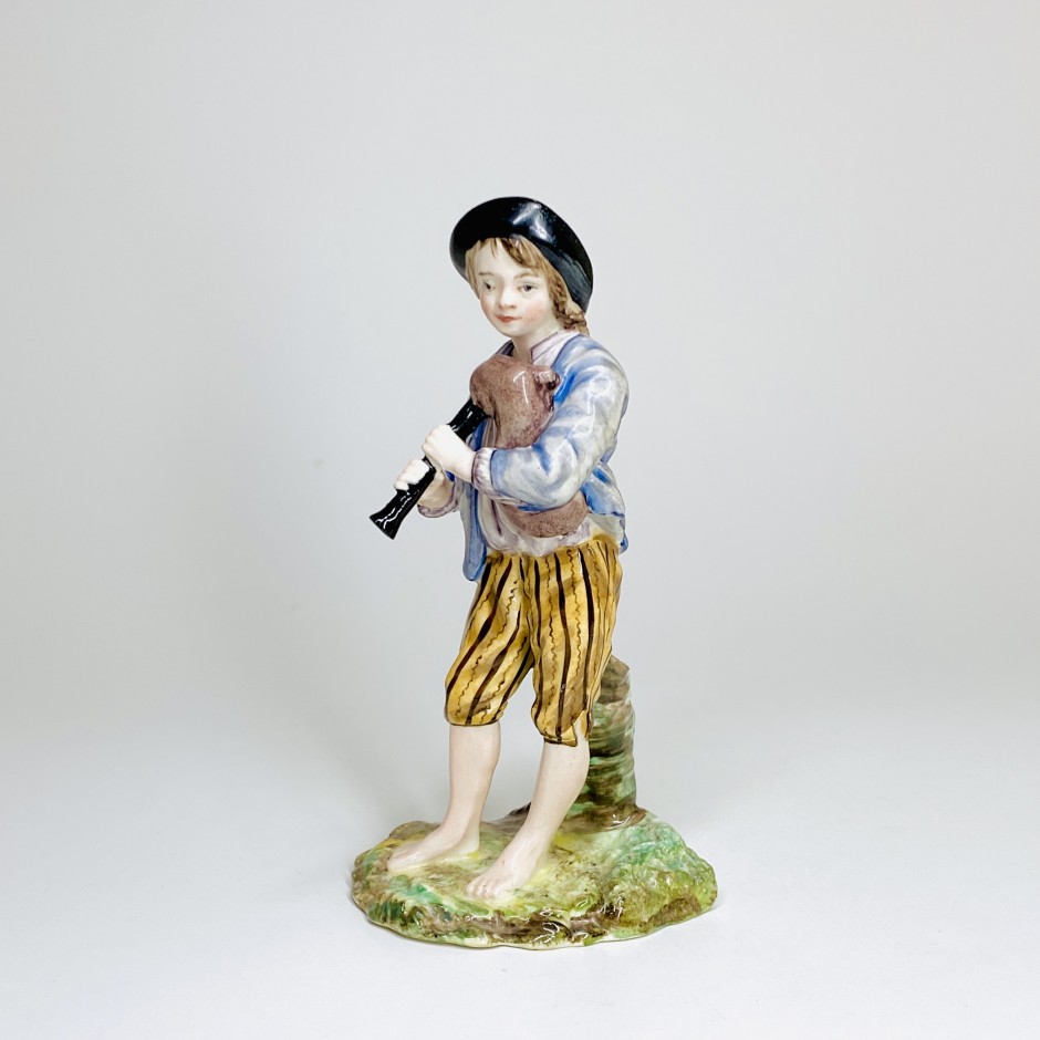 Statuette en faïence de Lunéville représentant un joueur de musette - XVIIIe siècle