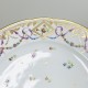 Bordeaux - Plate decorated with a seedling of flowers and garlands on the edge - Eighteenth century