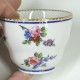 Tasse dite gobelet "Hébert" et sa soucoupe à décor polychrome - XVIIIe siècle