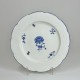 Three Chantilly porcelain plates with a carnation - Eighteenth century