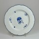 Three Chantilly porcelain plates with a carnation - Eighteenth century