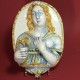 Nevers earthenware of the seventeenth century - plate forming an arm holding a candle