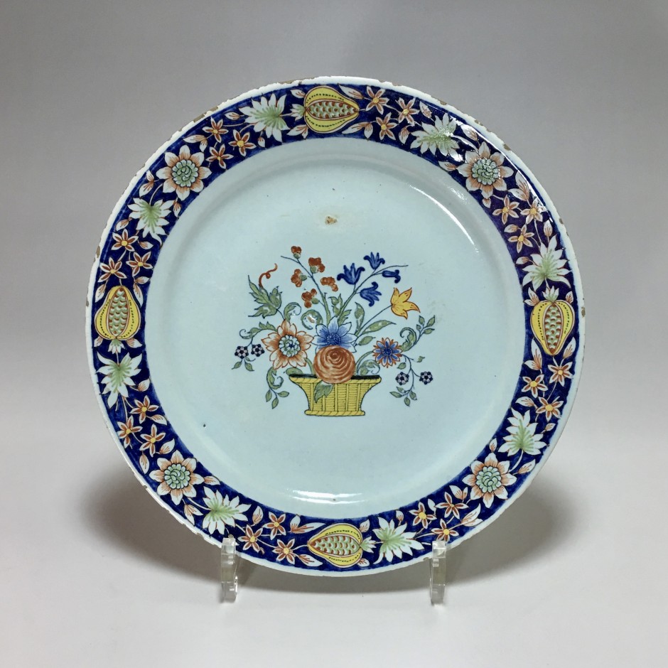 ROUEN - Plate with flower basket - eighteenth century