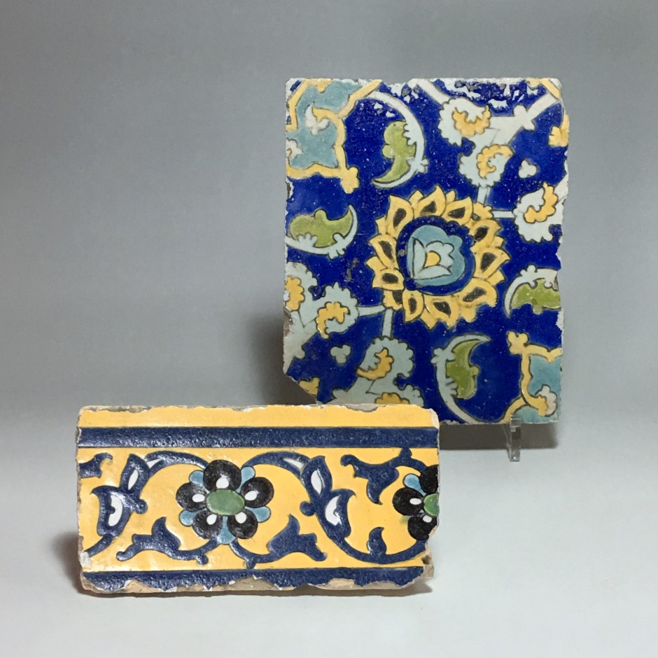 Two polychrome floral decoration tiles in style "cuerda seca" - Iran - Safavid Art - Seventeenth century.