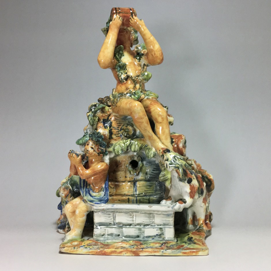Fountain depicting Bacchus in majolica from Urbino, Patanazzi workshop circa 1580.