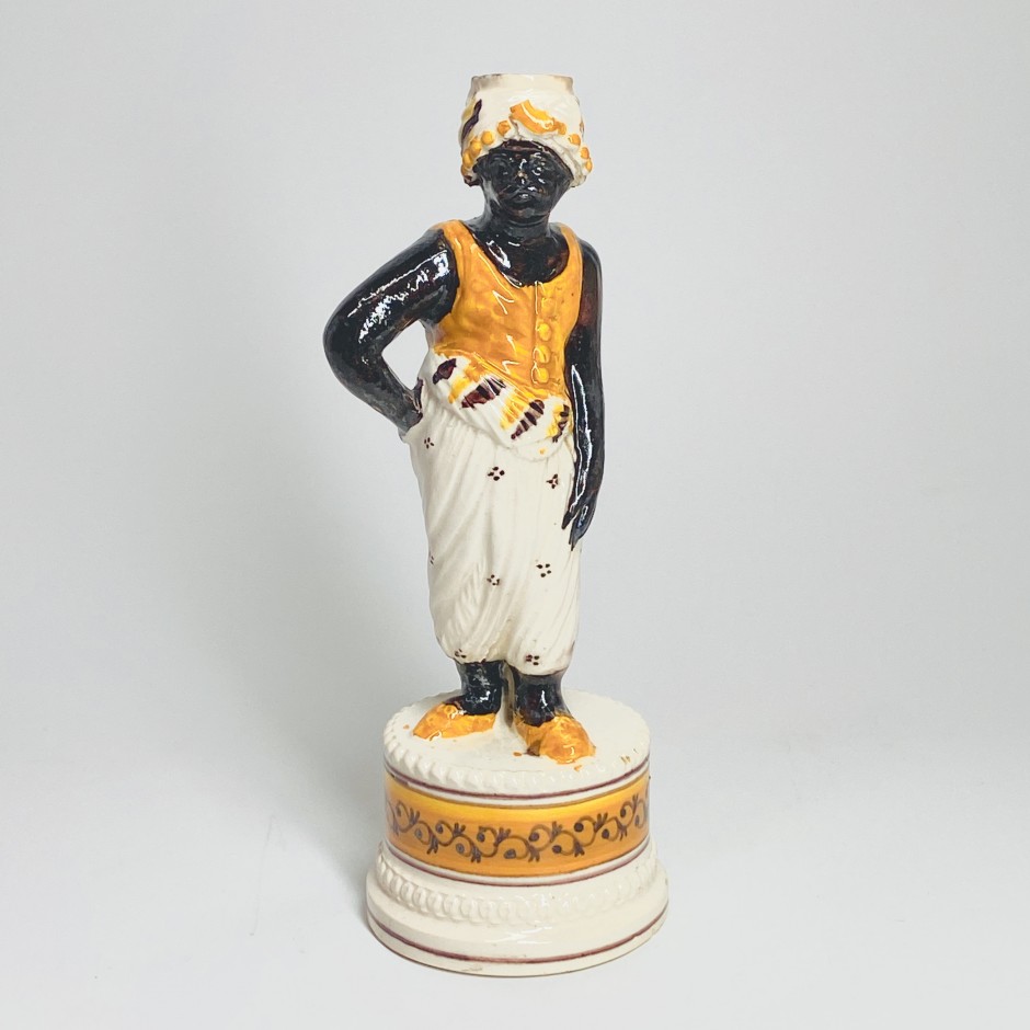 Fine earthenware candlestick depicting a Moor - Nineteenth century - SOLD