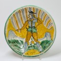 Montelupo - Majolica dish decorated with a man on a striped background with a flag - Seventeenth century - VENDU