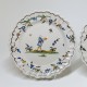 Pair of earthenware plates from Roanne - Eighteenth century